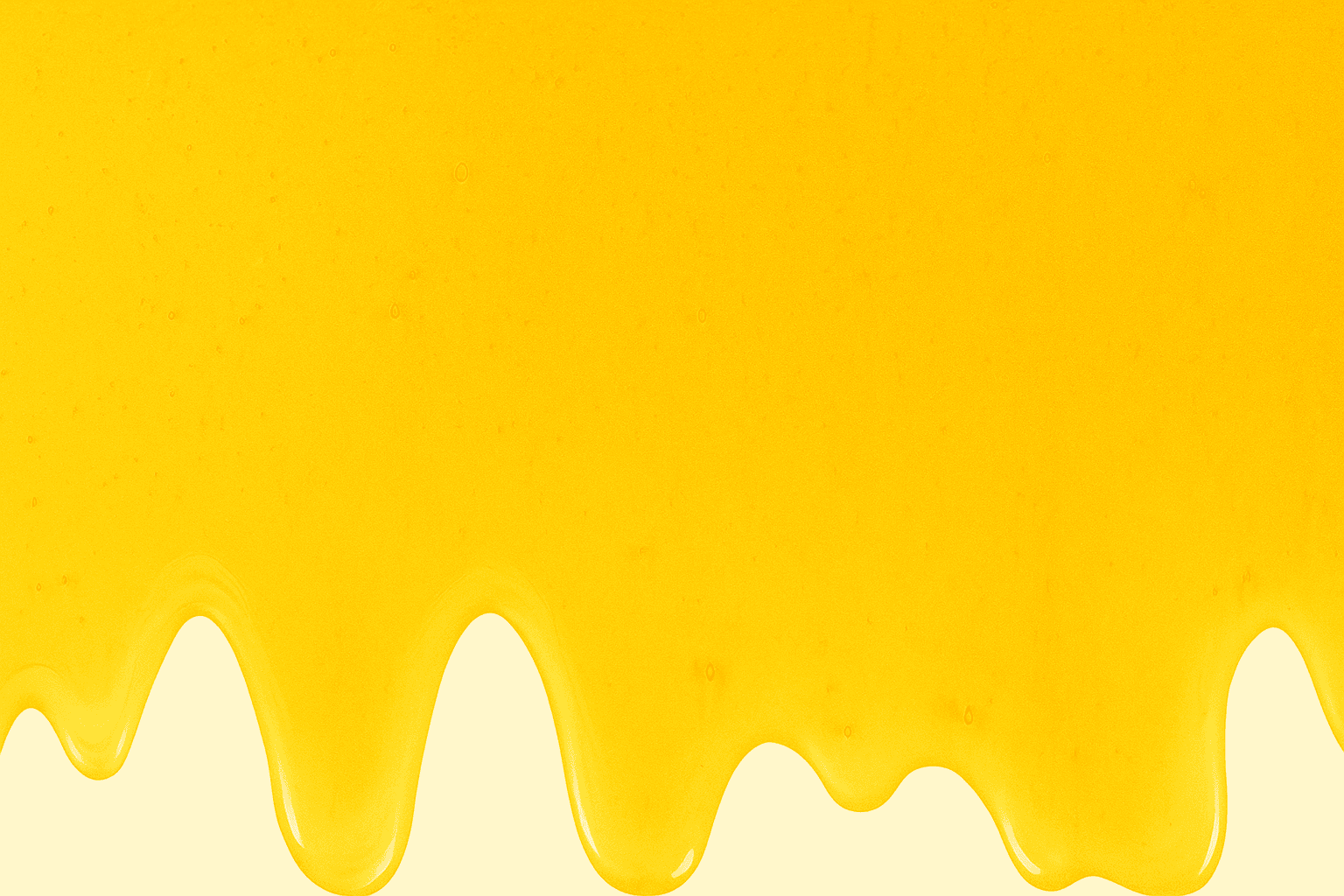 Golden honeycomb and flowing raw honey background