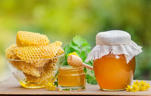 Processing & Packaging process showing sustainable beekeeping and raw honey production - Step 1